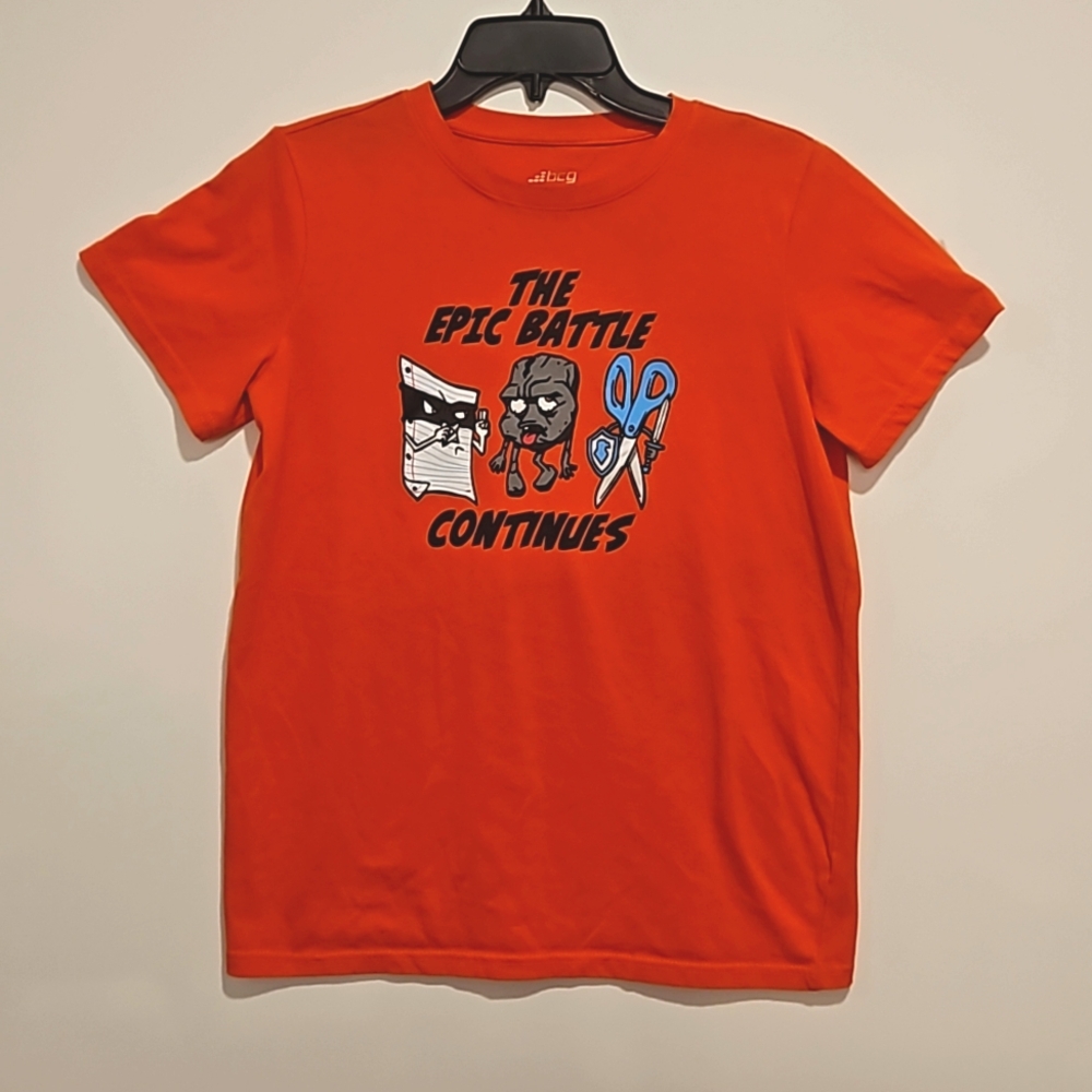 The Epic Battle Continues Rock Paper Scissors orange graphic tee XL (18-20)